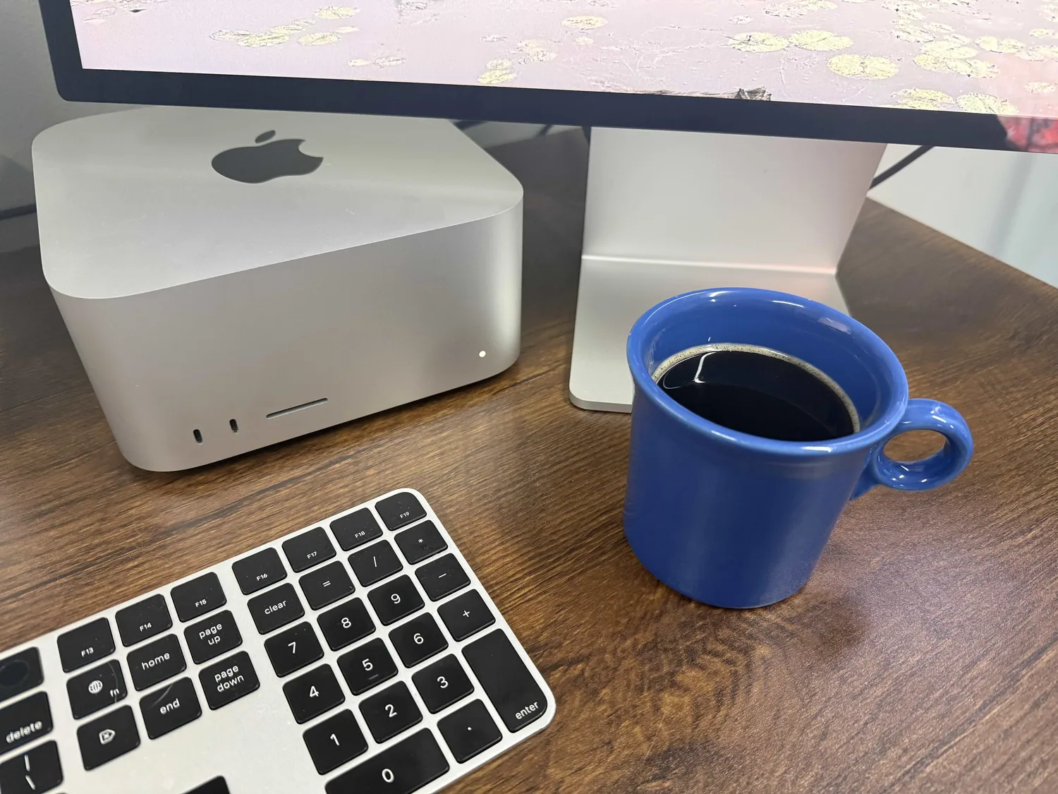 Mac Studio with Cup of Coffee